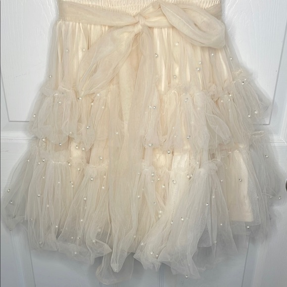 Cream Fit and Flare Mini Dress with Flutter Sleeves - Picture 4 of 9